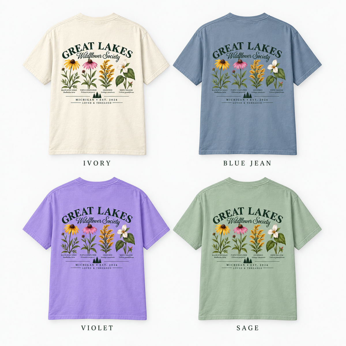 Four short-sleeve graphic T-shirts shown from the back on a light gray background, labeled by color as Ivory, Blue Jean, Violet, and Sage. Each shirt features a large floral illustration and the text 'GREAT LAKES Wildlife Society' with smaller text below.