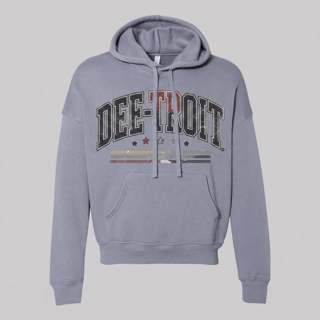 A light gray pullover hoodie with a distressed 'DEE-TROIT' graphic on the chest, featuring a kangaroo pocket and drawstring hood, shown against a solid gray background.