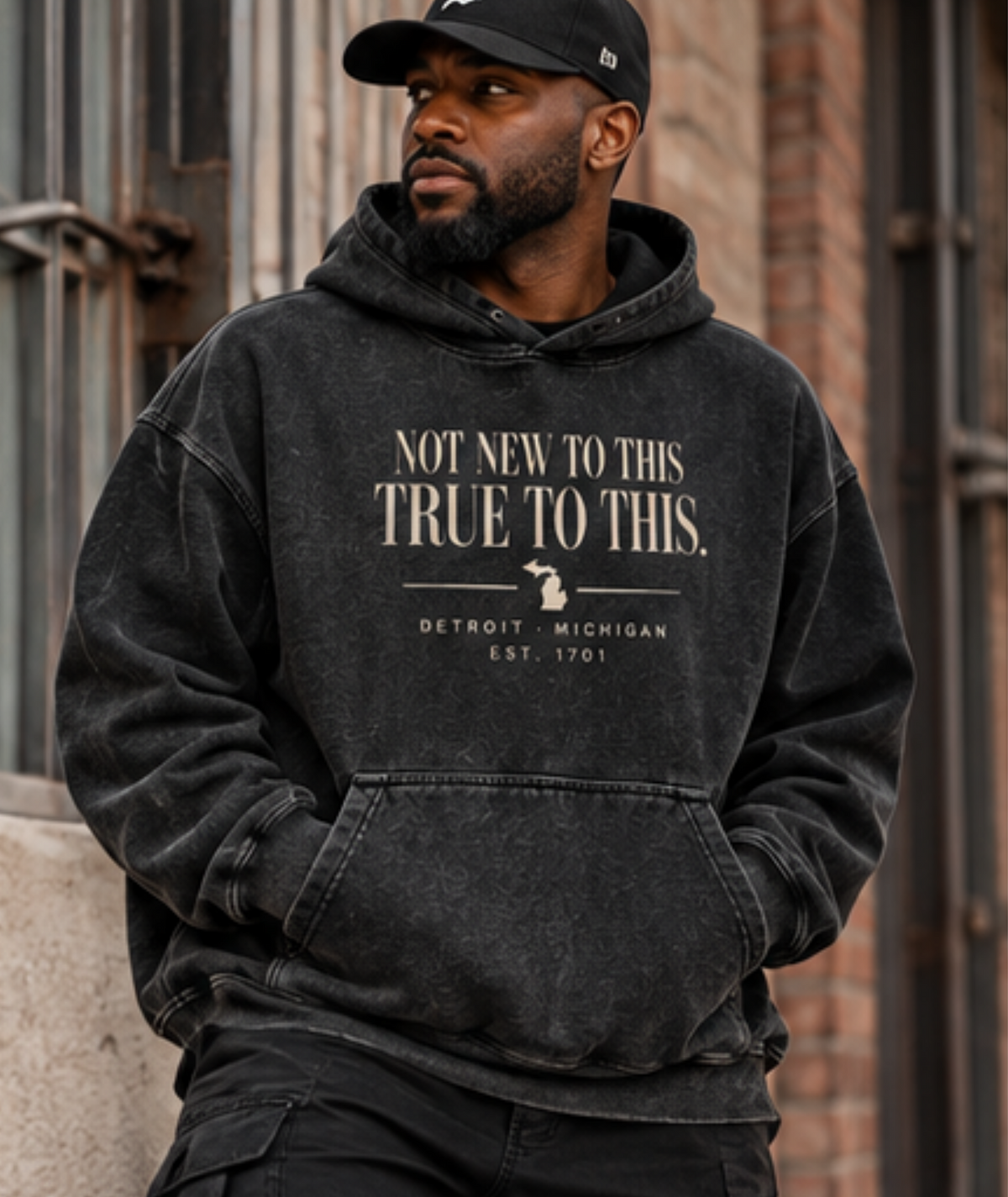 Oversized Detroit streetwear hoodie styled in washed black for fall and winter